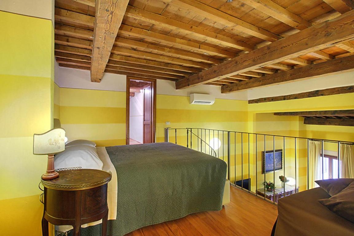 Apartments Puccini Флоренция Стая снимка